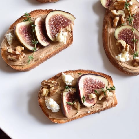 French appetizer The Royal Tapestry: A close-up shows the layered pâté, figs, cheese, and walnuts.